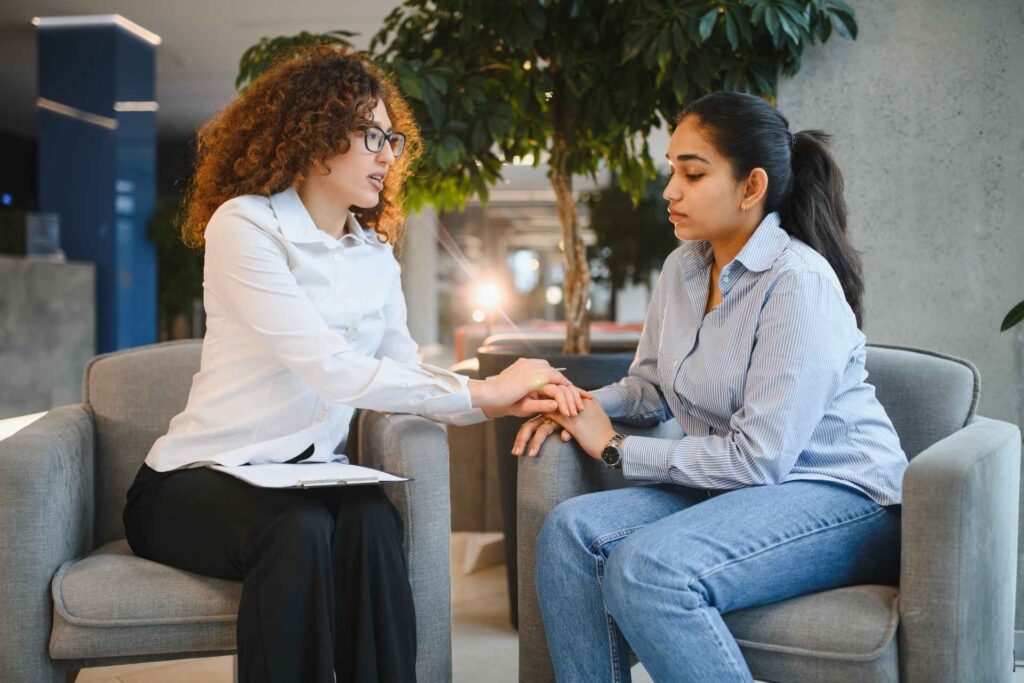 Therapist supporting a client during CBT treatment for anxiety and depression.