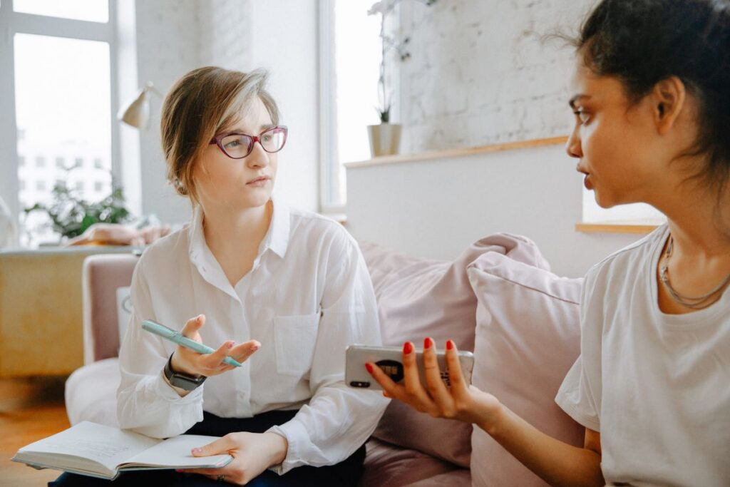 two women talking during a therapy session