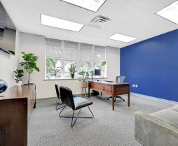 An office with a desk at New Mind