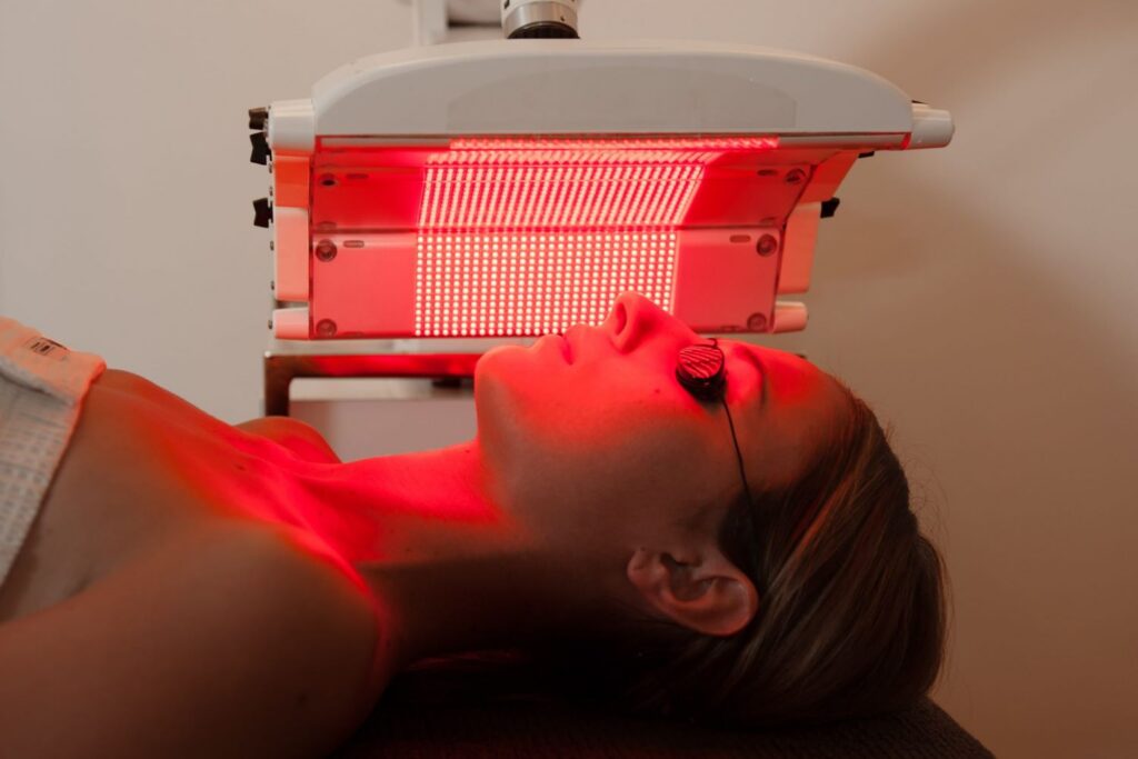 A woman undergoing red light therapy in Philadelphia