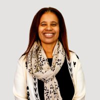 Dr. Sonya Knight, Medical Director at New Mind Wellness Center, posing for a professional portrait at the mental health center.